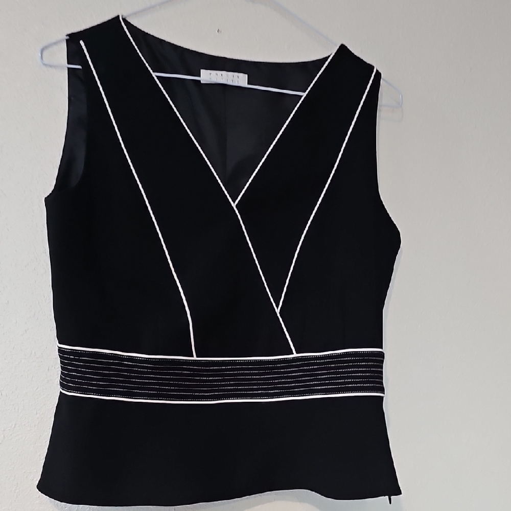 Chic Black Sleeveless Blouse with White Trim